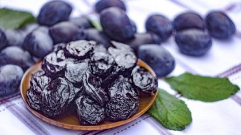 Dewfresh 3KG stewed prunes in pear juice, ideal for snacking, baking, or cooking, sourced from New Zealand.