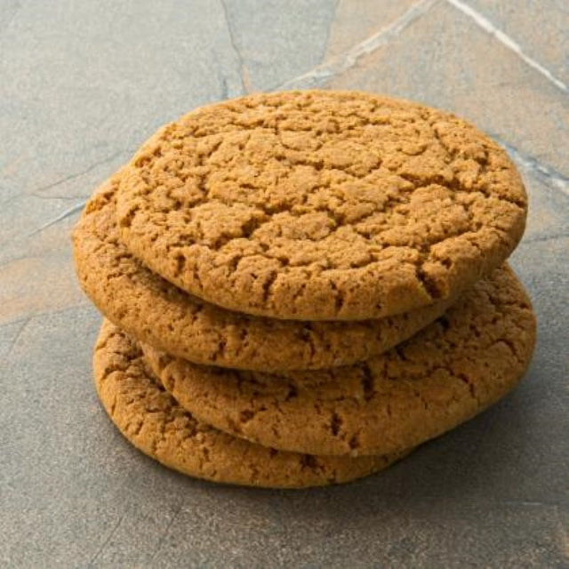 Crunchy gingernut biscuits with spicy ginger flavor, perfect for tea or coffee, packaged in a bulk of 26 pieces.