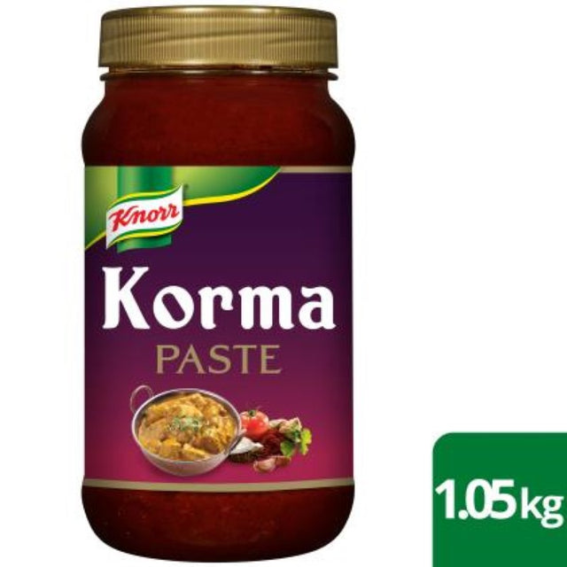 A 1.05KG jar of Knorr Pataks Korma paste, featuring coconut, tomatoes, ginger, and spices for authentic Indian cuisine.