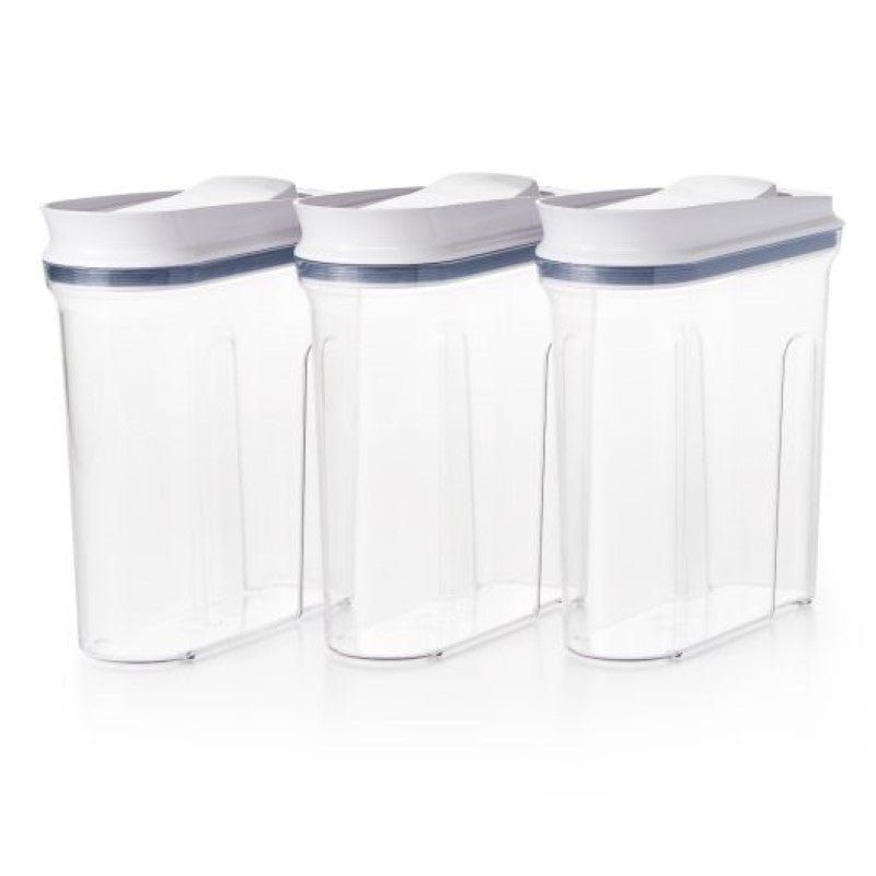 A set of three OXO Good Grips POP cereal dispensers with an airtight design for fresh storage and easy one-handed pouring.