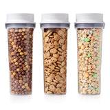 Airtight OXO Good Grips cereal dispenser set (3pcs) for fresh storage of cereals, snacks, and dry goods with easy one-handed operation.