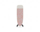 Compact Joseph Joseph Glide Easy-store Ironing Board with adjustable height and smooth setup, featuring a cotton cover and silicone iron rest.