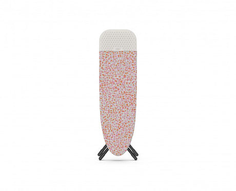 Compact Joseph Joseph Glide Easy-store Ironing Board with adjustable height and smooth setup, featuring a cotton cover and silicone iron rest.