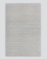 Handwoven 250x350cm rug in warm beige, featuring a textured knotted weave for comfort and style in any room.