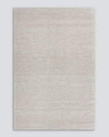 Handwoven beige Cyrus Earth rug (250x350cm) with textured knotted weave, perfect for adding warmth and style to any room.