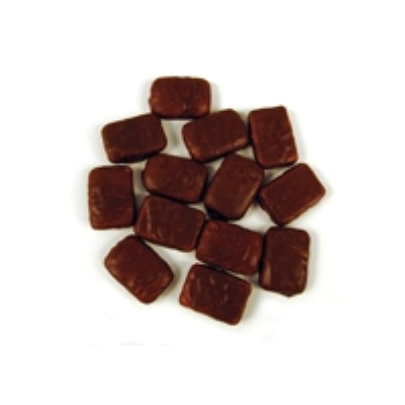 Chocolate-dipped pineapple chunks in a colorful 1KG pack, gluten-free treat made in New Zealand.