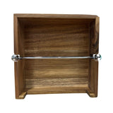 Elegant acacia wood napkin holder featuring natural grain, perfect for organizing napkins and enhancing dining decor.