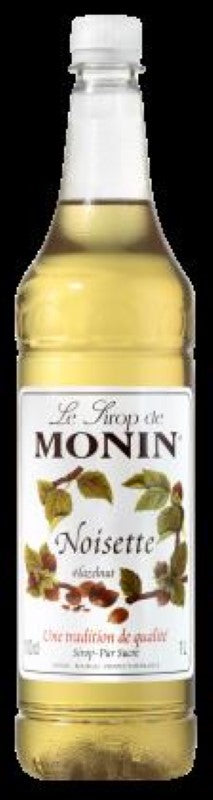 Bottle of Monin Hazelnut Syrup (1L) featuring a rich, nutty flavor for enhancing coffees, lattes, and cocktails.