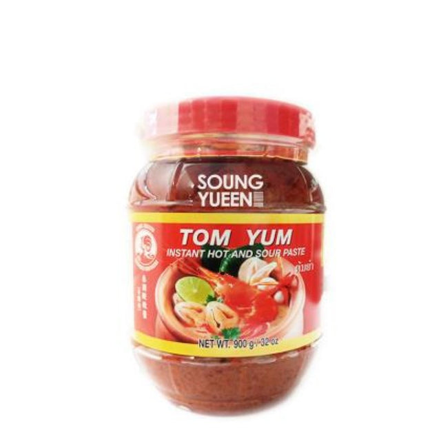 Authentic 900g Tom Yum paste by Cock Brand, perfect for flavorful Thai soups and stir-fries rich in lemongrass and spices.