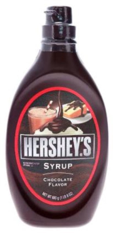 Rich HERSHEY'S Chocolate Sauce in a 680g squeeze bottle, perfect for drizzling on desserts or making chocolate milk.