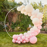 Nude and pink balloon arch kit featuring 75 latex balloons in various sizes, perfect for elegant celebrations and photo backdrops.