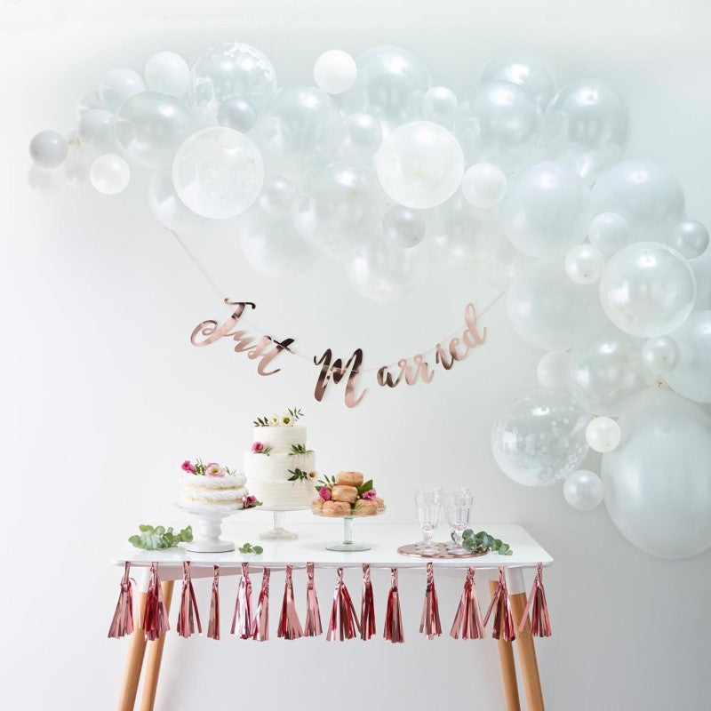 White Balloon Arch Kit with 70 balloons, including confetti and pearl options, perfect for elegant event decor.