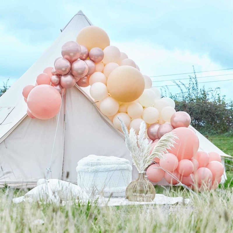 Rose gold chrome and nude balloon arch kit with 200 balloons, perfect for special occasions and easy assembly.