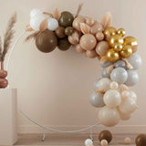 Taupe, brown, and nude balloon arch kit with 75 balloons and decorative fans for elegant celebrations and photo backdrops.