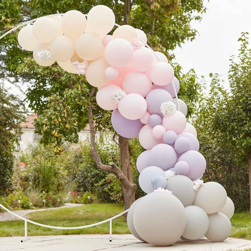 Luxe balloon arch in pink, lilac, and grey with hydrangeas, perfect for elegant celebrations and easy to assemble.