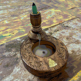 Handcrafted Buddha Backflow Burner in mango wood with antique finish and cascading smoke for a serene relaxation experience.