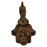 Hand-carved Hamsa Backflow Burner in mango wood with antique finish, creating soothing smoke waves for tranquility.