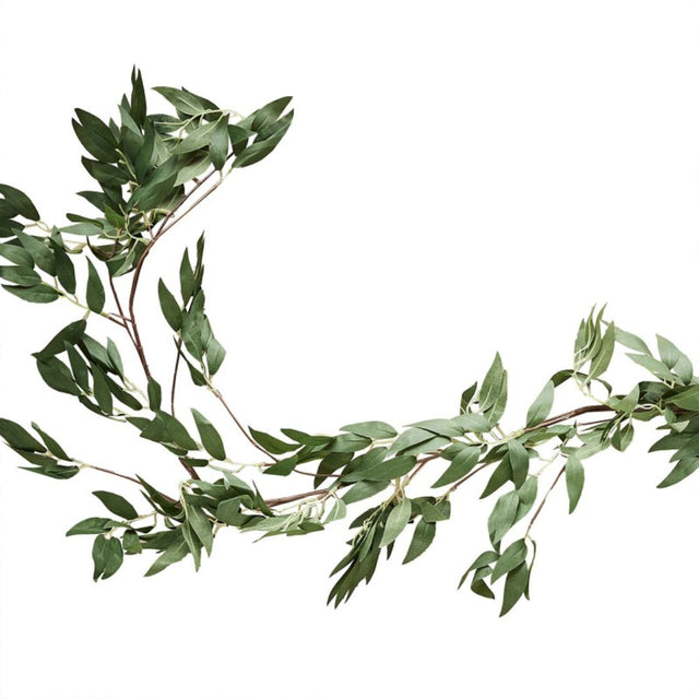 Lush 1.8m green ruscus foliage garland, perfect for wedding decor, adding elegance to arches and table settings.