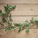 Lush 1.8m green ruscus garland, perfect for wedding decor, adding natural beauty to tables, arches, and backdrops.