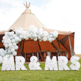 Botanical Wedding Balloon Mosaic "Mr & Mrs" stand with elegant letters, perfect for wedding decor and photo backdrops.