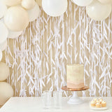 Botanical wedding curtain backdrop with white leaf design; perfect for stunning photo opportunities at events.