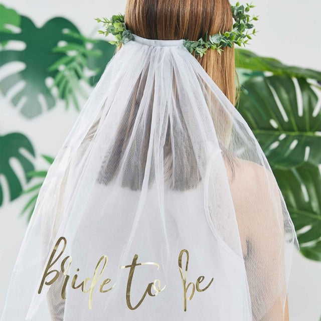 Botanical hen party crown featuring eucalyptus leaves and a shimmering veil, perfect for brides-to-be celebrations.