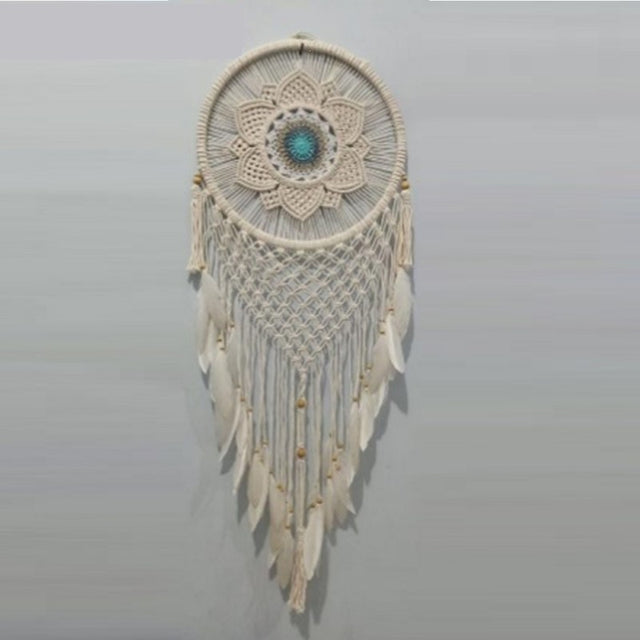 Natural 40cm dreamcatcher adorned with teal flowers, feathers, and twine, perfect for home decor and spiritual protection.
