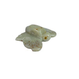 Set of 5 handcrafted butterfly soapstone carvings, showcasing unique designs and vibrant colors for home decor.