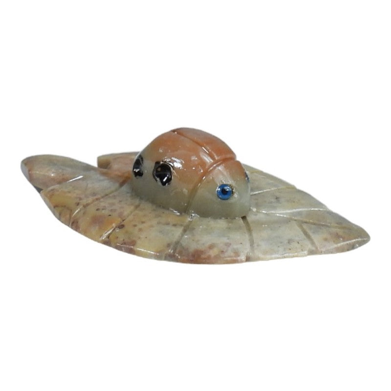 Set of 5 hand-carved soapstone ladybug figurines, each uniquely colored and sized, perfect for home decor or gifts.