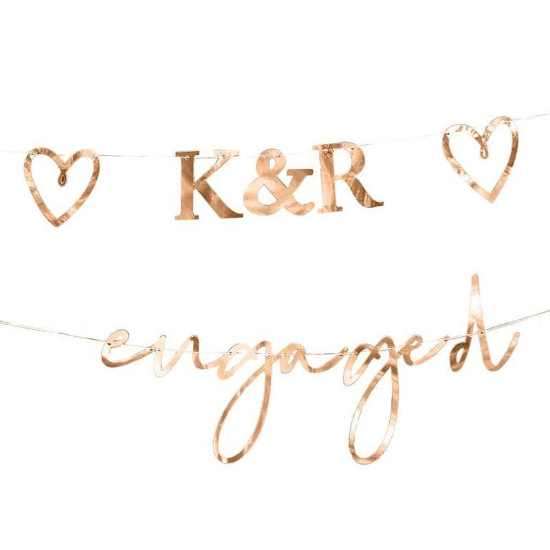 Engaged bunting in rose gold, customizable initials & hearts, perfect for engagement celebrations and decorations.