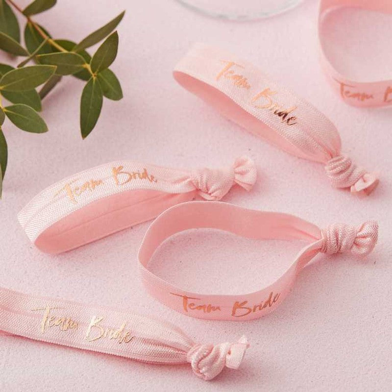 Floral hen party hair and wrist bands, pack of 5, perfect for bridesmaids with vibrant patterns for stylish celebrations.