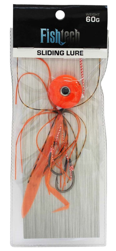 Vibrant orange Fishtech 60g Slippery Slider Lure with a unique jig head and fluttering skirt, ideal for attracting various fish.