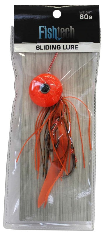 Vibrant orange Fishtech 80g Slippery Slider Lure with unique jig head, enticing skirt, and fluttering ties for effective fishing.