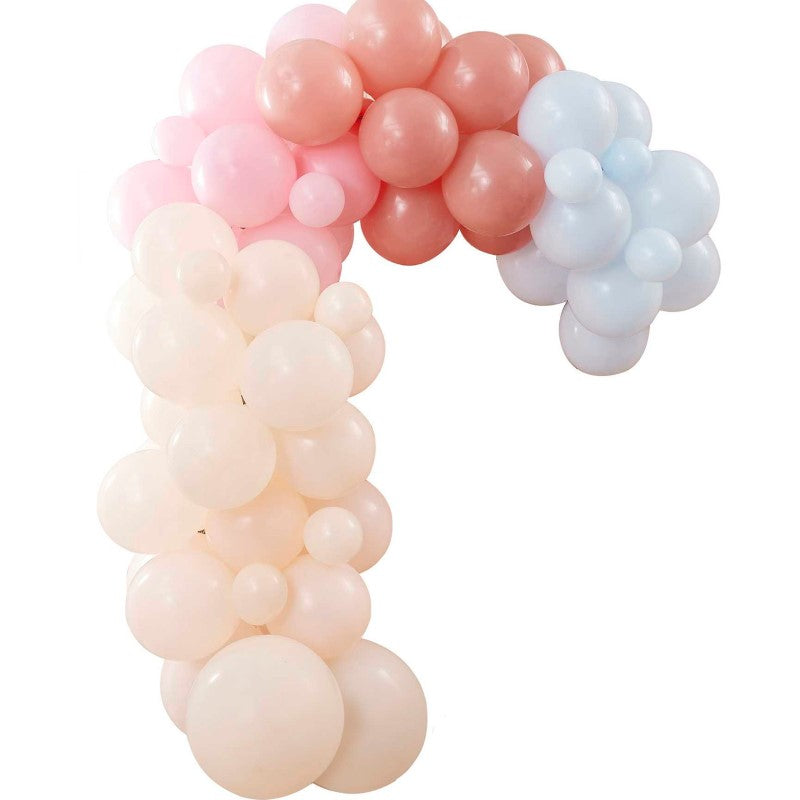 Pastel balloon arch backdrop featuring 75 balloons in peach, pink, and blue for vibrant celebrations and events.