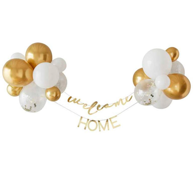 Gold and white balloon backdrop kit with "Welcome" and "Home" bunting for enchanting baby celebrations.