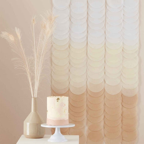 Neutral ombre tissue paper disc backdrop, 1.8m tall, with 18 strands for elegant party decor and photo opportunities.