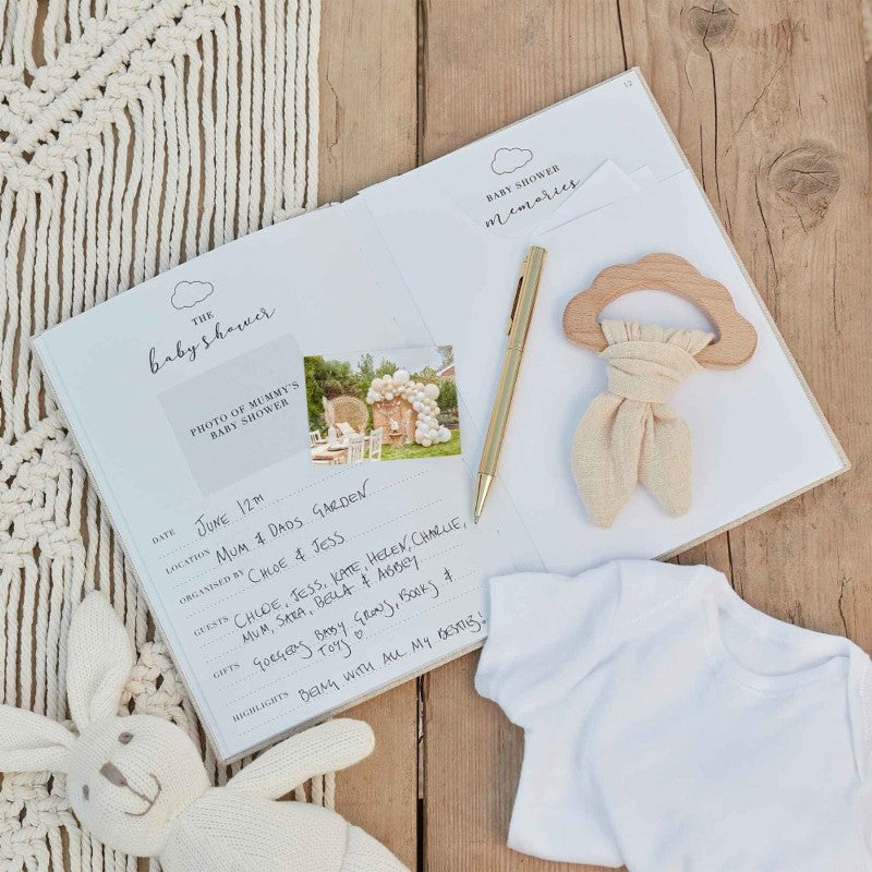 Elegant neutral linen baby journal measuring 22.5cm x 16.5cm, perfect for capturing early milestones and memories.