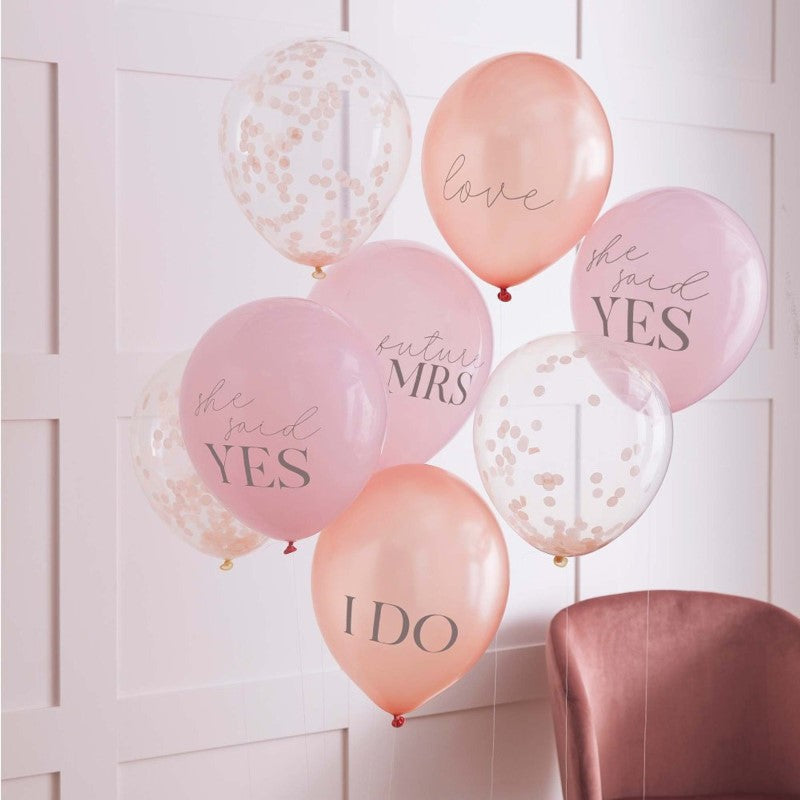 Colorful 30cm hen party balloons with playful slogans and confetti, perfect for bridal showers and celebrations.