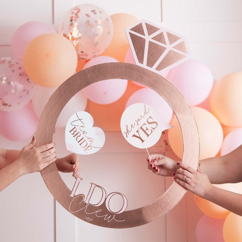 Rose gold ring photo booth frame for hen parties, 59cm W x 74cm H, perfect for memorable group photos and celebrations.