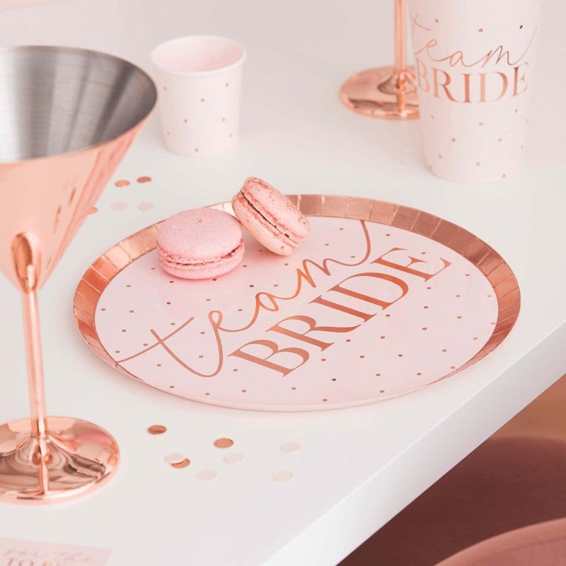 Rose gold Team Bride plates with blush pink background, perfect for stylish hen parties and Bachelorette gatherings. Pack of 8.