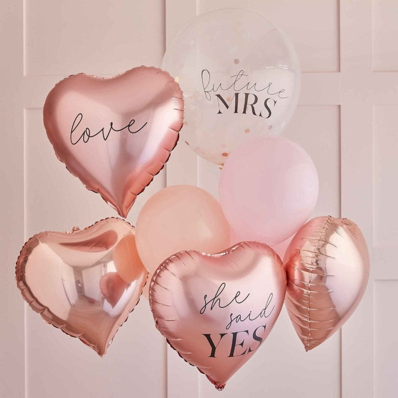 Rose gold hens party balloons pack of 9, featuring heart designs and 'Future Mrs' confetti balloon for memorable celebrations.