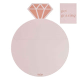 Rose gold and pink ring-shaped grazing board kit, perfect for serving snacks at bridal showers and engagement parties.