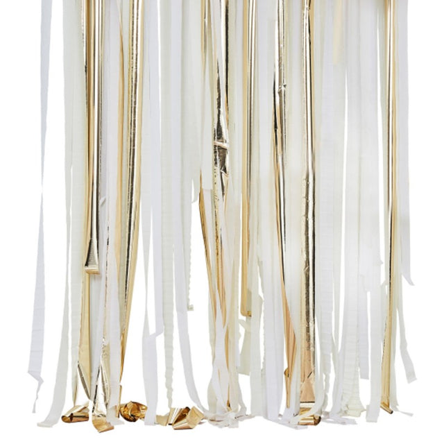 Gold metallic streamers in various colors create a stunning party backdrop for celebrations and photo booths.