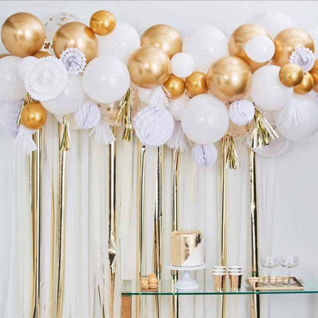 Gold Balloon and Fan Garland backdrop, featuring 80 balloons and paper decor, perfect for elegant party celebrations.