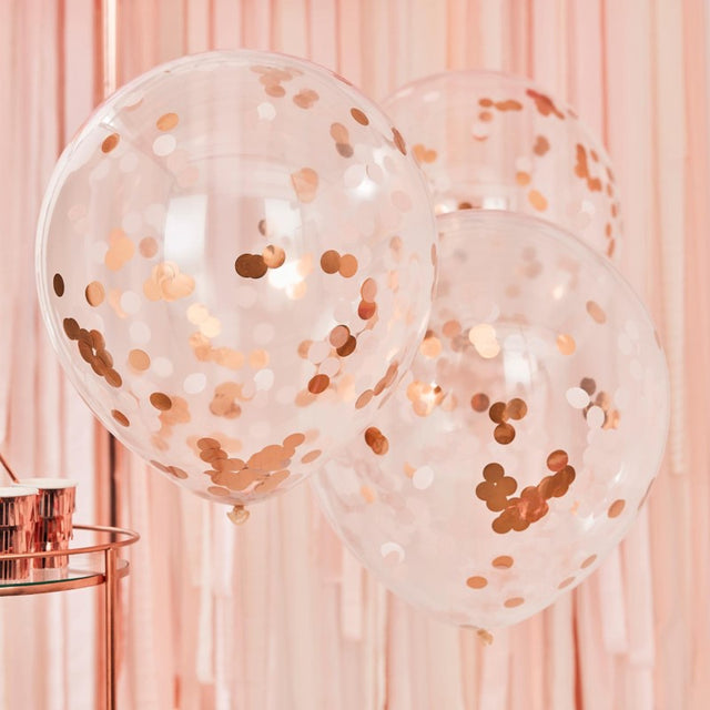 Giant rose gold and blush confetti balloons, 22 inches, adding elegance to any celebration with shimmering confetti accents.