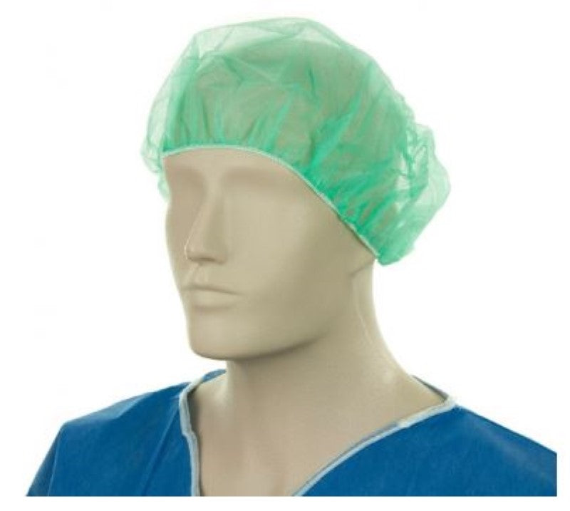 Disposable green polypropylene bouffant hats, 610mm wide, designed for larger hairstyles, packed in a box of 600.