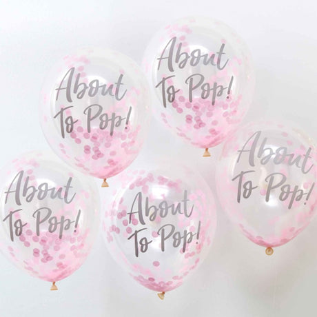 Pack of 5 confetti pink "About To Pop" balloons, 12"/30cm, perfect for baby showers and gender reveals.