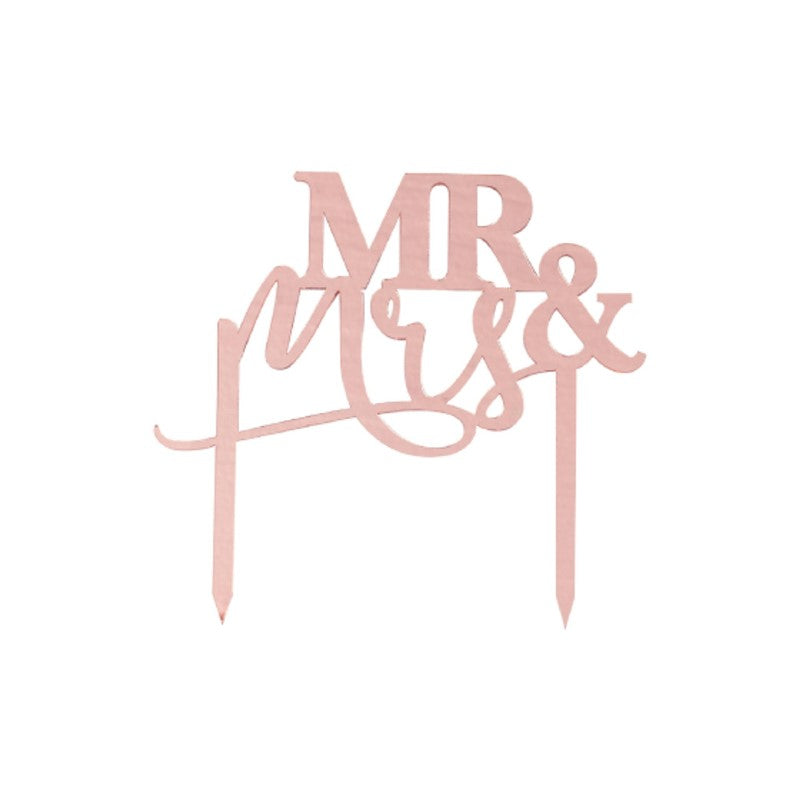 Rose gold acrylic wedding cake topper reading 'Mr and Mrs', enhancing celebration with elegance and charm.