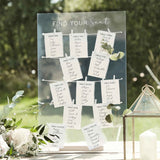 Acrylic wedding table plan with wooden stand and 12 labeled cards, perfect for guiding guests to their seats.