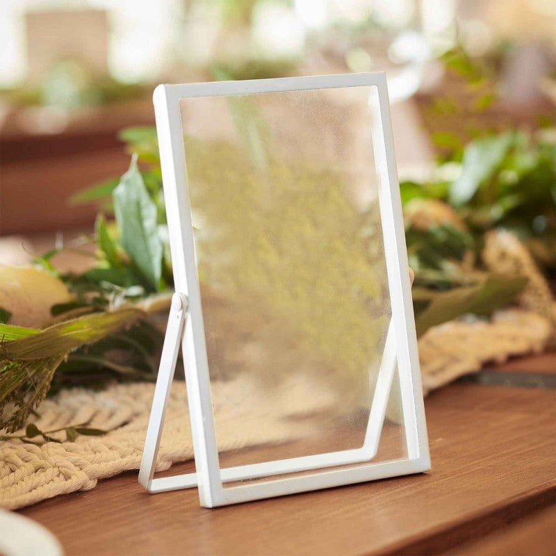 Elegant white metal and glass photo frame, perfect for weddings and home decor, customizable with photos or letters.